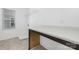 Functional laundry room includes a spacious countertop and practical shelving at 111 Stonewater Dr # 25, Red Cross, NC 28129