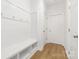 Entryway mudroom features a wood floor, storage bench, and convenient hooks for coats at 111 Stonewater Dr # 25, Red Cross, NC 28129