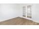 Bright office featuring wood-look floors and french doors at 111 Stonewater Dr # 25, Red Cross, NC 28129