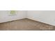 Neutral bedroom with carpeted floors and natural light at 124 Hunters Creek Dr, Mooresville, NC 28115