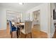 Stylish dining area with hardwood floors and view of the adjoining rooms at 124 Hunters Creek Dr, Mooresville, NC 28115