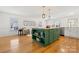 Open concept kitchen with a large green island, butcher block countertop, and stainless steel appliances at 124 Hunters Creek Dr, Mooresville, NC 28115