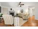 Cozy living room with hardwood floors, fireplace, comfortable seating, and natural light at 124 Hunters Creek Dr, Mooresville, NC 28115