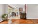 Charming dining area featuring natural lighting, tile floors, and access to the kitchen at 12628 Waterfall Pl, Charlotte, NC 28278