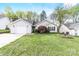 Charming single-story home with manicured lawn, landscaping, and a one-car garage at 12628 Waterfall Pl, Charlotte, NC 28278