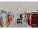 Spacious walk-in closet with custom shelving, ample storage for clothing, and plenty of room for organization at 1305 Anniston Pl, Wesley Chapel, NC 28079