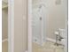 Bathroom features a shower with shelves and a toilet at 1323 Queens Rd # 420, Charlotte, NC 28207