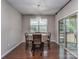 Cozy dining area with hardwood floors and sliding glass doors to the outdoor patio at 140 Halifax Dr, Fort Mill, SC 29707