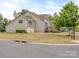 Charming home exterior with well-manicured lawn and a side-entry garage on a corner lot at 140 Halifax Dr, Fort Mill, SC 29707