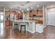 Modern kitchen with a large island, stainless steel appliances, and hardwood floors at 140 Halifax Dr, Fort Mill, SC 29707