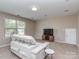 Basement Living Room with Plush Seating and Entertainment Area, featuring a large window at 140 Halifax Dr, Fort Mill, SC 29707