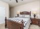 Comfortable main bedroom with classic furnishings including a wood-framed bed and side tables at 140 Halifax Dr, Fort Mill, SC 29707