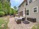 Enjoy outdoor living on this expansive backyard patio with a built-in grill and comfortable seating at 140 Halifax Dr, Fort Mill, SC 29707