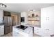 Modern kitchen features stainless steel appliances, white cabinetry, and granite countertops at 1488 Ernest Rd, York, SC 29745