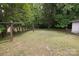 Large, grassy backyard with clotheslines at 166 Still Ave, Fort Mill, SC 29715