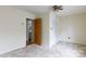 Cozy bedroom with view to a tiled bathroom and closet at 166 Still Ave, Fort Mill, SC 29715