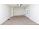 Bright bedroom with a ceiling fan and natural light from a large window at 166 Still Ave, Fort Mill, SC 29715