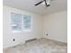 Bright bedroom with carpet flooring and large windows at 166 Still Ave, Fort Mill, SC 29715