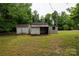 Several storage sheds located in the backyard of the property at 166 Still Ave, Fort Mill, SC 29715