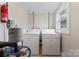 Laundry room with washer, dryer, water heater and fire extinguisher at 18 Douglas Nw Ave, Concord, NC 28025