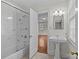 Traditional bathroom featuring tile flooring, open access to the bedroom and shower with a glass door at 1949 S Wendover Rd, Charlotte, NC 28211