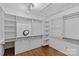 Walk-in closet with custom shelving providing ample storage and organization at 1949 S Wendover Rd, Charlotte, NC 28211