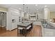 Gourmet kitchen boasting a large island, stainless steel appliances, and custom cabinetry at 1949 S Wendover Rd, Charlotte, NC 28211