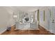 Bright and airy living room showcasing hardwood floors, neutral tones, and a cozy fireplace at 1949 S Wendover Rd, Charlotte, NC 28211