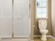 Bright bathroom showcasing a glass shower door, toilet, and small window, all neatly arranged at 2112 Columbidae Ln, Gastonia, NC 28052