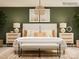 Comfortable bedroom with a bed, wooden bench, lamps on bedside tables, and tasteful wall decor at 2112 Columbidae Ln, Gastonia, NC 28052