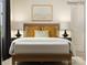 Bright bedroom features a wooden bedframe with lamps and a bench, accented with colorful pillows at 2112 Columbidae Ln, Gastonia, NC 28052