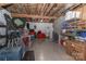 Unfinished basement with block walls, storage, and visible ceiling beams at 212 Davies Cir, Cleveland, NC 27013
