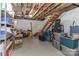 Unfinished basement with wooden staircase and storage at 212 Davies Cir, Cleveland, NC 27013