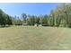 Expansive lot with well-maintained lawn and multiple outbuildings offers endless possibilities at 212 Davies Cir, Cleveland, NC 27013