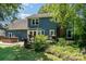 Exterior backyard featuring a patio with a hot tub, a deck, and lush landscaping creating a private retreat at 2278 Jon Chris Dr, Harrisburg, NC 28075