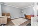 Empty bedroom with modern gray walls, flooring, and trim at 2278 Jon Chris Dr, Harrisburg, NC 28075