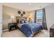 Comfortable bedroom features a wood-frame bed, side tables, and natural light at 247 Tackle Box Dr, Troutman, NC 28166