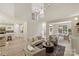 Open-concept living room with views into the kitchen and dining areas, featuring comfortable seating and modern decor at 2544 Barrington Ct, Rock Hill, SC 29732