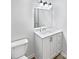Clean bathroom with white vanity, mirror, toilet, and modern lighting at 269 Bud Black Rd, Crouse, NC 28033