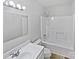 Clean and simple bathroom with a shower, toilet, and a vanity with modern fixtures at 269 Bud Black Rd, Crouse, NC 28033