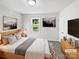Comfortable bedroom with plush bedding, natural lighting, and modern decor at 269 Bud Black Rd, Crouse, NC 28033