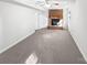 Spacious living room features a brick fireplace and neutral carpet at 269 Bud Black Rd, Crouse, NC 28033