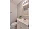 This bathroom has an undermount sink, a plant for decor and a framed mirror at 301 Walkers Ridge Dr, Shelby, NC 28152