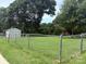 Fenced backyard featuring well-maintained lawn and shed at 318 Huffman Rd, Gastonia, NC 28056