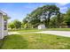Spacious backyard with room for a garden, shed, and extra parking at 318 Huffman Rd, Gastonia, NC 28056
