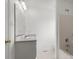 Clean bathroom features a tub-shower combo, and a large mirror at 318 Huffman Rd, Gastonia, NC 28056