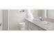 Bathroom with a light-colored vanity, white toilet, and neutral flooring at 318 Huffman Rd, Gastonia, NC 28056