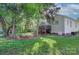 Enjoy outdoor living in this landscaped backyard with mature trees and lush lawn at 3226 Chatfield Sw Ln, Concord, NC 28027