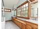 Bright bathroom with double vanity, window, and large walk in shower at 3231 Karen Ln, Monroe, NC 28110