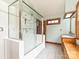 Well lit bathroom featuring walk-in shower and vanity at 3231 Karen Ln, Monroe, NC 28110